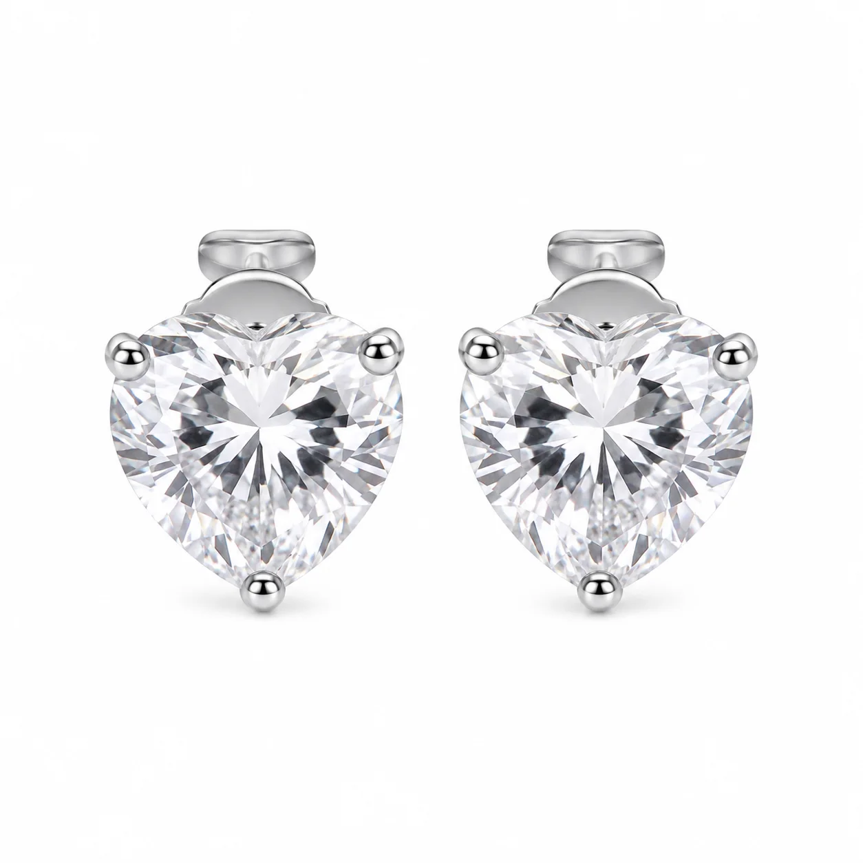 Aretes de acero corazón plateado