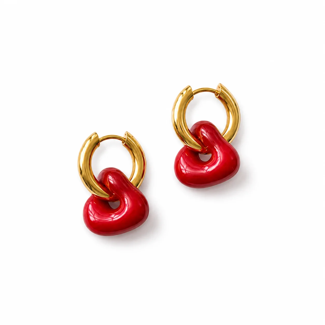 Aretes clip corazón rojo dorado en acero inoxidable
