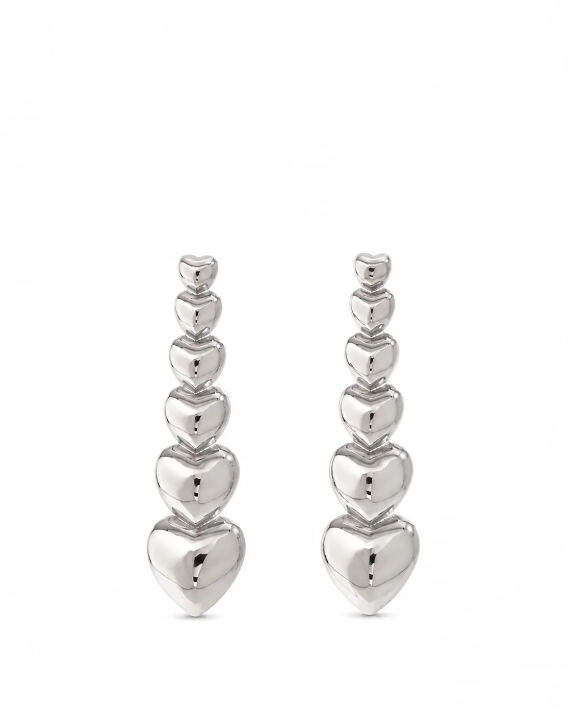 Aretes elegantes de corazon largos